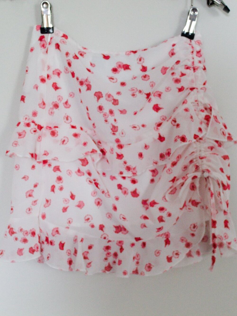 Princess Polly size 2 pink and white floral skirt with drawstring side